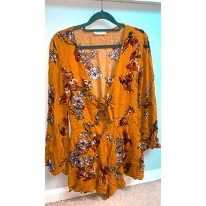 Floral burn yellow romper